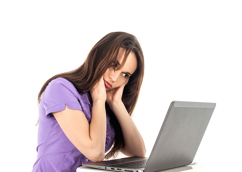 image of woman using a laptop