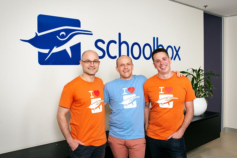 From the left to right Sean Richards, Matthew Sambell and James Leckie standing next to each other and wearing 'I love Schoolbox' shirts