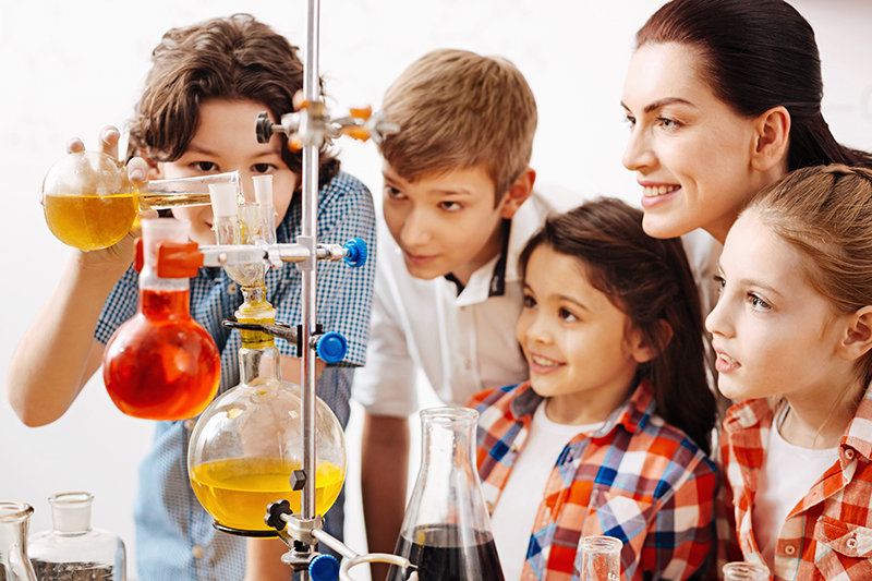 students learning in a science class